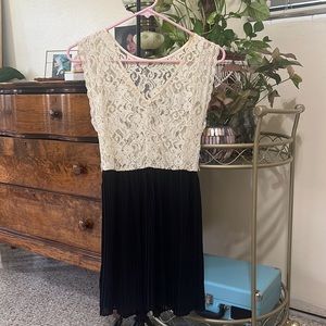 Lace top dress with pleated bottom